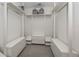 Spacious walk-in closet with ample shelving and drawers at 332 Cocoanut Ave # 503, Sarasota, FL 34236