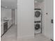 Convenient laundry room with stacked washer and dryer at 332 Cocoanut Ave # 503, Sarasota, FL 34236