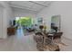 Bright living room with large windows and city views at 332 Cocoanut Ave # 503, Sarasota, FL 34236
