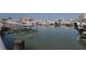 Boats docked at Sarasota marina, reflecting in calm waters at 332 Cocoanut Ave # 503, Sarasota, FL 34236