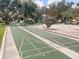 Enjoy friendly competition on well-maintained shuffleboard courts at 1264 Red Oak Ln, Port Charlotte, FL 33948
