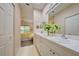 Double vanity bathroom with view of bedroom at 1264 Red Oak Ln, Port Charlotte, FL 33948