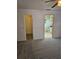Spacious carpeted bedroom featuring access to a walk-in closet and an en-suite bathroom at 4619 Flint Dr, North Port, FL 34286