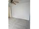 A comfortable bedroom with neutral carpet, white walls, and a ceiling fan at 4619 Flint Dr, North Port, FL 34286