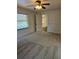 Comfortable bedroom with neutral carpet and a window view at 4619 Flint Dr, North Port, FL 34286