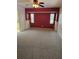 Spacious main bedroom with neutral carpet, bright accent wall, and ample natural light at 4619 Flint Dr, North Port, FL 34286