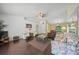 Living room boasts hardwood floors, ample seating, and a relaxing atmosphere at 4619 Flint Dr, North Port, FL 34286