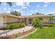 Landscaped walkway leading to the home's entrance at 4619 Flint Dr, North Port, FL 34286