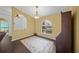 Dining room with dark hardwood floors and archways at 4619 Flint Dr, North Port, FL 34286