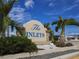 The inlets community sign with landscaping at 600 Carriage House Ln # 104, Nokomis, FL 34275