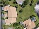 Aerial image showing two houses and a pool at 600 Carriage House Ln # 104, Nokomis, FL 34275