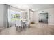 Bright dining area with a round table and white chairs at 2129 Royal Tern Cir, Punta Gorda, FL 33983