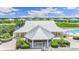 Community clubhouse with a metal roof and covered patio at 2133 Royal Tern Cir, Punta Gorda, FL 33983