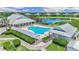 Resort-style pool with plenty of lounge chairs at 2133 Royal Tern Cir, Punta Gorda, FL 33983