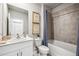 Clean bathroom with a tub, toilet and single vanity at 2133 Royal Tern Cir, Punta Gorda, FL 33983