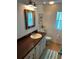 Clean bathroom with updated vanity and flooring at 406 Trento, Venice, FL 34285