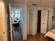 View from bedroom down hallway into living room at 406 Trento, Venice, FL 34285