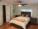Bright bedroom with double bed, nightstands, and a large closet at 406 Trento, Venice, FL 34285