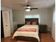 Bright bedroom with double bed, nightstands, and a large closet at 406 Trento, Venice, FL 34285
