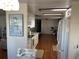 View of kitchen and living areas with wood flooring at 406 Trento, Venice, FL 34285