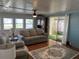 Spacious living room with hardwood floors and ample natural light at 406 Trento, Venice, FL 34285