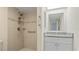 Updated bathroom with accessible shower featuring stylish tile and modern fixtures at 8 Quails Run Blvd # 6, Englewood, FL 34223