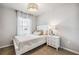 Cozy bedroom with a comfortable bed and window coverings at 2129 Royal Tern Cir, Punta Gorda, FL 33983