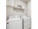 Laundry room with washer and dryer at 2129 Royal Tern Cir, Punta Gorda, FL 33983