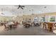 Bright community room with tables and chairs, perfect for gatherings at 2129 Royal Tern Cir, Punta Gorda, FL 33983