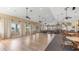 Large community room featuring hardwood floors and plenty of seating at 2129 Royal Tern Cir, Punta Gorda, FL 33983