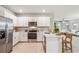 Open concept kitchen featuring stainless steel appliances and island at 2129 Royal Tern Cir, Punta Gorda, FL 33983