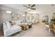 Spacious living area with sectional sofa and adjacent dining space at 2129 Royal Tern Cir, Punta Gorda, FL 33983