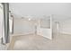 Spacious living room with high ceilings and an open floor plan, showcasing a partial wall at 2143 Starlite Ln, Port Charlotte, FL 33952