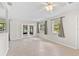 Bright and airy living room with French doors and large windows, perfect for relaxation at 2143 Starlite Ln, Port Charlotte, FL 33952