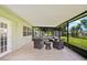 Spacious screened porch, perfect for outdoor relaxation at 2143 Starlite Ln, Port Charlotte, FL 33952