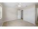 Well-lit bedroom with double-door closet and window, offering ample space at 2143 Starlite Ln, Port Charlotte, FL 33952