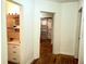 Bright hallway with wood floors, bathroom and closet access at 5709 33Rd E St, Bradenton, FL 34203