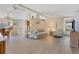 Open concept living area with a view into the kitchen at 107 Tahitian Way, North Port, FL 34287
