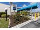 Lazy River community building with covered entrance at 107 Tahitian Way, North Port, FL 34287