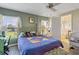 Spacious bedroom with ample natural light and access to bathroom at 107 Tahitian Way, North Port, FL 34287