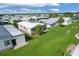 Mobile home with spacious backyard in a residential community at 107 Tahitian Way, North Port, FL 34287