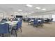 Spacious community room with tables and chairs for events at 107 Tahitian Way, North Port, FL 34287