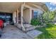 House exterior with covered porch and stone steps at 107 Tahitian Way, North Port, FL 34287