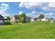 View of the back of the home from the yard at 107 Tahitian Way, North Port, FL 34287