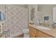 Clean bathroom with shower/tub combo and granite vanity at 20193 Pezzana Dr, Venice, FL 34292
