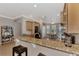 Eat-in kitchen with granite countertops and stainless steel appliances at 20193 Pezzana Dr, Venice, FL 34292