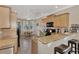 Modern kitchen with granite countertops and ample cabinet space at 20193 Pezzana Dr, Venice, FL 34292