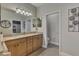 Modern bathroom with double vanity and updated fixtures at 20193 Pezzana Dr, Venice, FL 34292