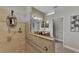 Accessible bathroom with walk-in shower and grab bars at 20193 Pezzana Dr, Venice, FL 34292