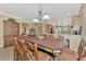 Spacious dining area with a large table perfect for Gathering gatherings at 20193 Pezzana Dr, Venice, FL 34292